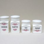 K103 - 4 Stück Vorratsdosen Zucker, Kaffee, Tee, Kakao, Keramik, Max Roesler, "Röschenmuster", Art Deco