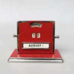 BS99 - ewiger Kalender von Jakob Maul, rot, verchromt, Art Deco