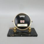 BS105 - ewiger Kalender, Mistral, Made in France, schwarz, goldfarben eloxiert, Marmorsockel