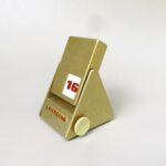 BS43 - ewiger Kalender, 60er Jahre, Aluminium goldfarben eloxiert, bez. FWK