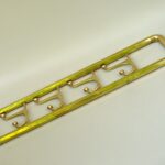 GA45 - Wandgarderobe mit Klapphaken, Art Deco, Messing